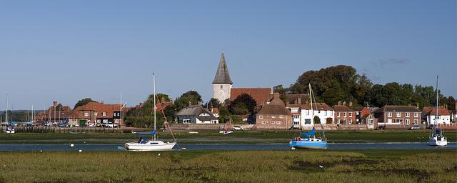Bosham Harbour view showing boats, the water and the church in the background